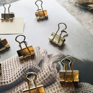 Pakke med 10 mini guld klemmer
