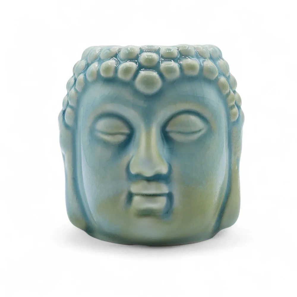 Buddha oliebrænder voks smelter varmer blå
