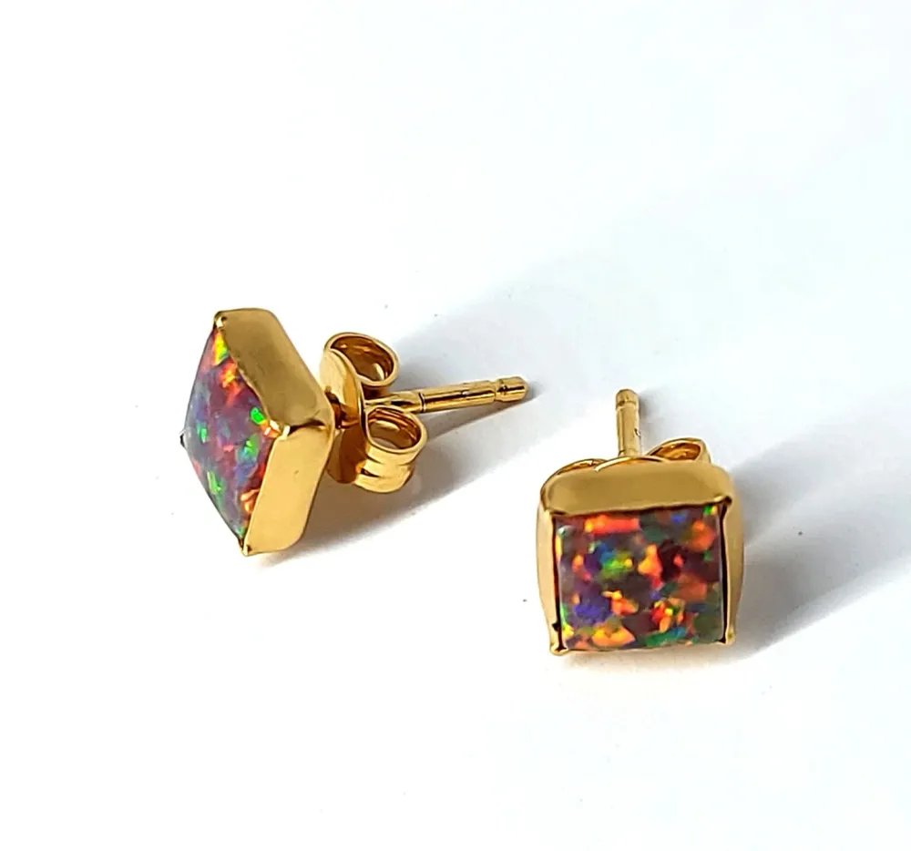 Ørestiks 7mm Fire opal med glat kant (925)