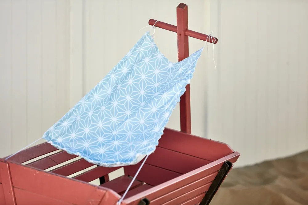Markise hvide diamanter på pastelblå